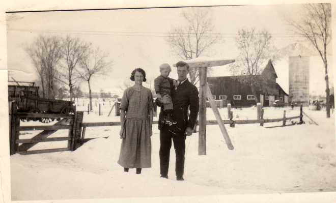 Olof and Edna Neilson holding Russell