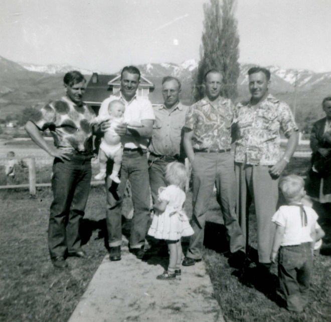 Golden, Art (holding Joy), Harold (CarolDean in front of him), Russell, Olof, and unknown boy
