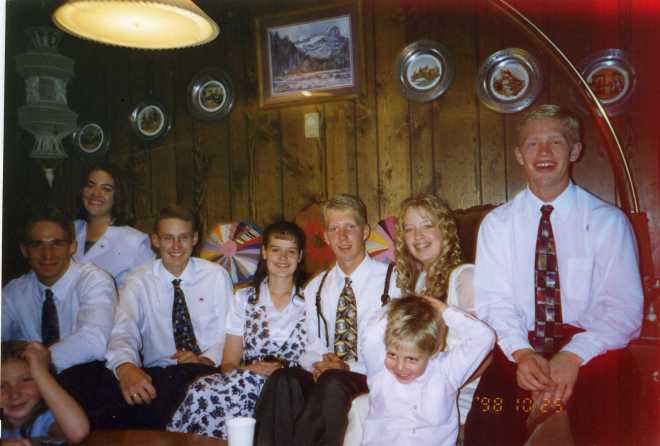 Chad Kunzler, Elena McBride, Patrick Jolley, Tara Nelson, Paul Ross, Kyla Jentzsch, Darren Jentzsch, with May and Jesse Melycher in front.